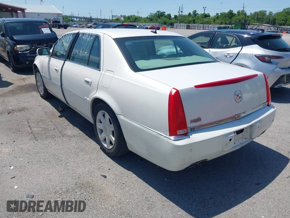 2006 Cadillac DTS 1SD z VIN 1G6KD57Y06U208812, wystawiony jako IAAI lot #42233924 z przebiegiem 120 244 mil mil oraz . Historia ofert i sprzedaży dostępna na DreamBid. Obrazek 3.