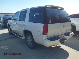 2000 Cadillac Escalade z VIN 1GYEK13R9YR149637, wystawiony jako IAAI lot #41599887 z przebiegiem 206 835 mil mil oraz . Historia ofert i sprzedaży dostępna na DreamBid. Obrazek 3.