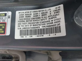 2010 Honda Insight EX with VIN JHMZE2H7XAS024879, listed as a IAAI auction lot 42029553 with 187,648 mi miles. Bid and sale history available at carsss.com. Image 9.