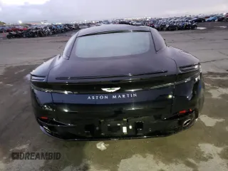 2023 Aston Martin DB11 z VIN SCFRMFAV3PGL11773, wystawiony jako Copart lot #82879093 z przebiegiem Nie podano mil oraz . Historia ofert i sprzedaży dostępna na DreamBid. Obrazek 6.
