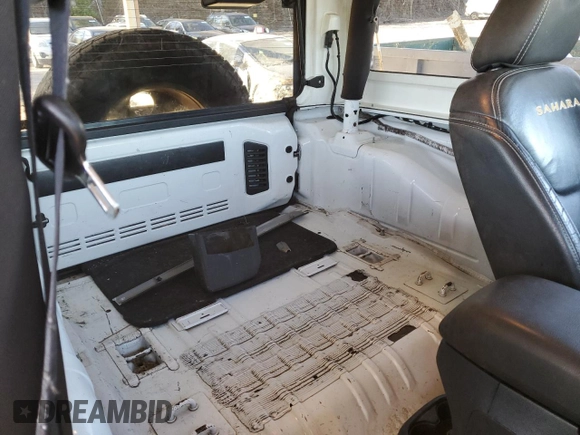 2014 Jeep Wrangler Sahara with VIN 1C4AJWBG1EL168007, listed as a Copart auction lot 87331394 with 113,228 mi miles and Salvage Title. Bid and sale history available at DreamBid. Image 10.
