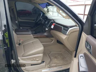 2017 Chevrolet Tahoe LT with VIN 1GNSCBKCXHR342170, listed as a IAAI auction lot 42137766 with 76,854 mi miles and . Bid and sale history available at DreamBid. Image 5.