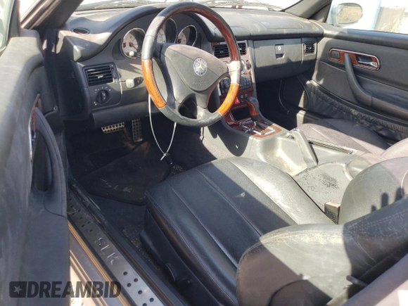 2001 Mercedes-Benz SLK-Class with VIN WDBKK65F11F178256, listed as a Copart auction lot 54979975 with 95,439 mi miles and Salvage Title. Bid and sale history available at carsss.com. Image 8.