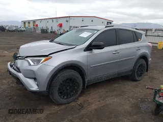 2018 Toyota RAV4 LE with VIN 2T3BFREV9JW724606, listed as a IAAI auction lot 41862028 with 98,590 mi miles. Bid and sale history available at carsss.com. Image 17.