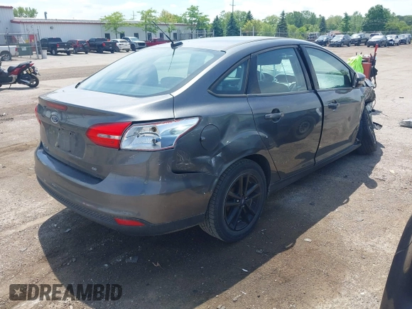 2017 Ford Focus SE with VIN 1FADP3F2XHL235013, listed as a IAAI auction lot 42370565 with 112,276 mi miles and . Bid and sale history available at DreamBid. Image 4.