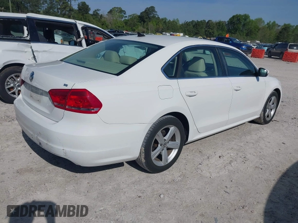 2013 Volkswagen Passat SE w/Sunroof with VIN 1VWBH7A30DC042088, listed as a IAAI auction lot 41990809 with 126,590 mi miles. Bid and sale history available at carsss.com. Image 4.