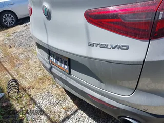 2018 Alfa Romeo Stelvio z VIN ZASFAKAN1J7B89142, wystawiony jako IAAI lot #42192248 z przebiegiem Nie podano mil oraz . Historia ofert i sprzedaży dostępna na DreamBid. Obrazek 17.