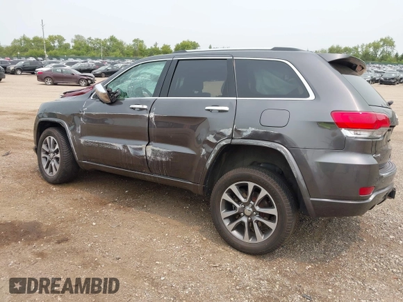 2017 Jeep Grand Cherokee Overland with VIN 1C4RJFCG6HC964435, listed as a IAAI auction lot 42407567 with 113,760 mi miles and . Bid and sale history available at DreamBid. Image 3.