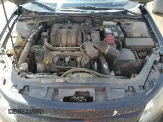 2012 Ford Fusion SEL z VIN 3FAHP0JG7CR297174, wystawiony jako Copart lot #55469005 z przebiegiem 129 434 mil mil oraz Szkoda całkowita • Salvage title. Historia ofert i sprzedaży dostępna na DreamBid. Obrazek 11.