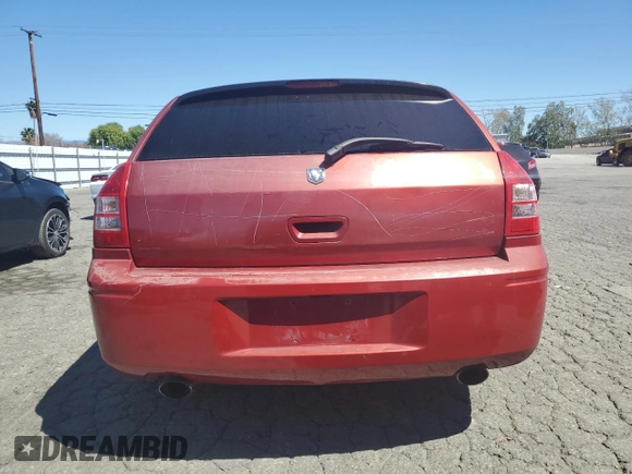 2006 Dodge Magnum R/T z VIN 2D4GV57256H121134, wystawiony jako Copart lot #49896945 z przebiegiem 83 640 mil mil oraz Szkody całkowita. Historia ofert i sprzedaży dostępna na DreamBid. Obrazek 6.