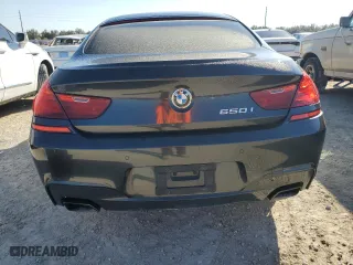 2015 BMW 6 Series 650i with VIN WBA6B2C58FD799063, listed as a Copart auction lot 77819914 with 0 mi miles and Salvage Title. Bid and sale history available at carsss.com. Image 6.
