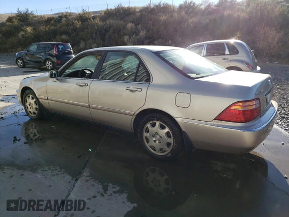 2000 Acura RL with VIN JH4KA9656YC014653, listed as a Copart auction lot 79079074 with 174,392 mi miles and Salvage Title. Bid and sale history available at carsss.com. Image 2.