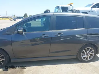 2014 Mazda 5 Grand Touring with VIN JM1CW2DL8E0171095, listed as a IAAI auction lot 41962650 with 85,048 mi miles and . Bid and sale history available at DreamBid. Image 14.