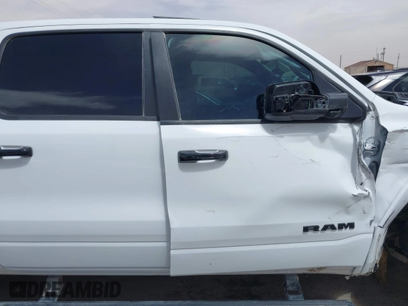 2023 Ram 1500 Limited with VIN 1C6SRFHT5PN576378, listed as a IAAI auction lot 42253096 with 41,802 mi miles and . Bid and sale history available at DreamBid. Image 12.