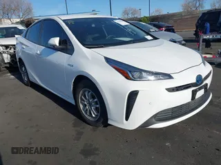 2021 Toyota Prius L Eco with VIN JTDKAMFU0M3149875, listed as a IAAI auction lot 41966010 with 99,542 mi miles. Bid and sale history available at carsss.com. Image 1.