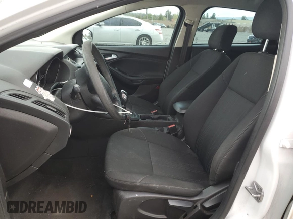 2016 Ford Focus SE with VIN 1FADP3F21GL284681, listed as a Copart auction lot 51140975 with 141,704 mi miles and Salvage Title. Bid and sale history available at DreamBid. Image 7.