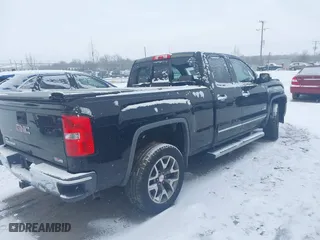 2014 GMC Sierra 1500 SLT with VIN 1GTV2VECXEZ100108, listed as a IAAI auction lot 41589773 with 203,471 mi miles. Bid and sale history available at carsss.com. Image 4.