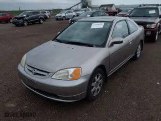 2003 Honda Civic EX with VIN 1HGEM22933L015145, listed as a IAAI auction lot 41928103 with 194,183 mi miles. Bid and sale history available at carsss.com. Image 2.