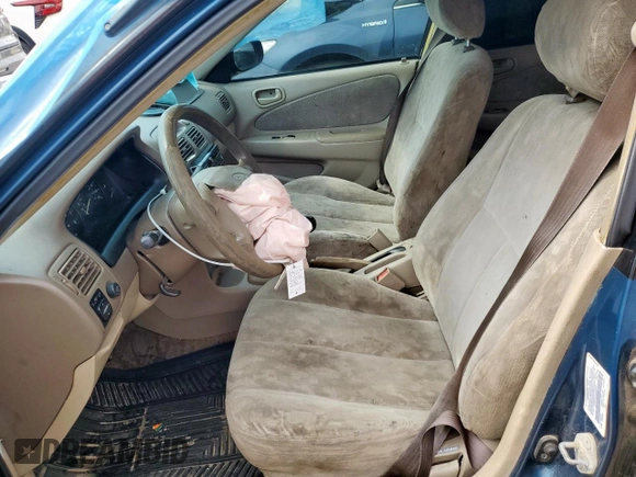 1998 Toyota Corolla VE with VIN 2T1BR18E6WC072503, listed as a Copart auction lot 58751795 with 306,052 mi miles and Salvage title. Bid and sale history available at DreamBid. Image 7.