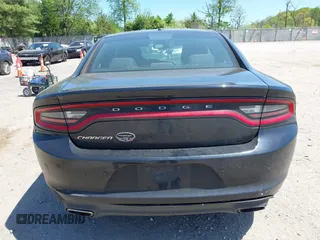 2015 Dodge Charger SE with VIN 2C3CDXBG9FH790573, listed as a IAAI auction lot 42142908 with 195,182 mi miles and . Bid and sale history available at carsss.com. Image 16.