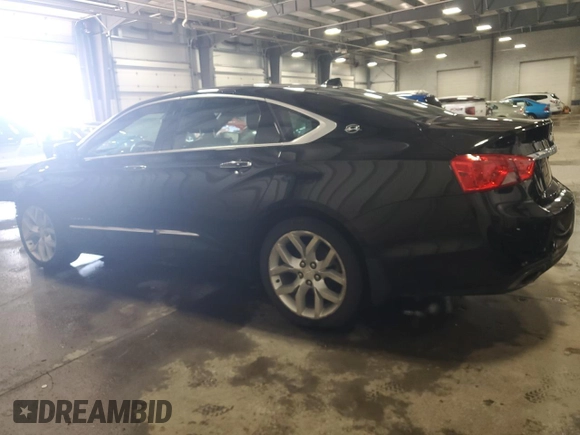 2014 Chevrolet Impala LTZ with VIN 2G1155S31E9275036, listed as a Copart auction lot 52099875 with 87,719 mi miles and Salvage title. Bid and sale history available at DreamBid. Image 2.