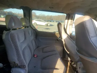 2000 Plymouth Voyager Grand SE z VIN 2P4GP44G6YR631700, wystawiony jako Copart lot #82873844 z przebiegiem Nie podano mil oraz Szkody całkowita. Historia ofert i sprzedaży dostępna na DreamBid. Obrazek 11.