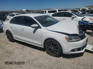 2014 Volkswagen Jetta SE with VIN 3VWD17AJ6EM265926, listed as a Copart auction lot 59060335 with 113,994 mi miles and Salvage title. Bid and sale history available at DreamBid. Image 4.