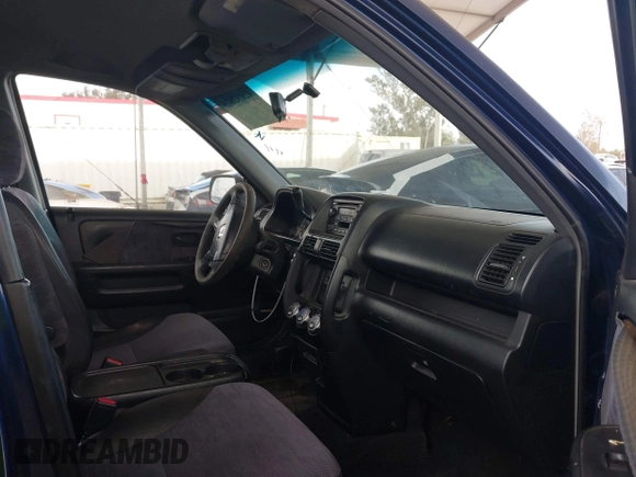 2004 Honda CR-V LX with VIN JHLRD684X4C023539, listed as a IAAI auction lot 42032809 with 186,056 mi miles and . Bid and sale history available at carsss.com. Image 5.