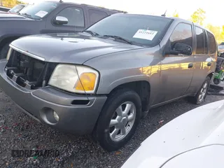 2005 GMC Envoy SLE with VIN 1GKDS13S352215032, listed as a IAAI auction lot 41221612 with 260,647 mi miles and . Bid and sale history available at DreamBid. Image 2.