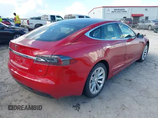 2017 Tesla Model S 60 with VIN 5YJSA1E14HF199130, listed as a IAAI auction lot 42544333 with 72,858 mi miles and . Bid and sale history available at DreamBid. Image 4.