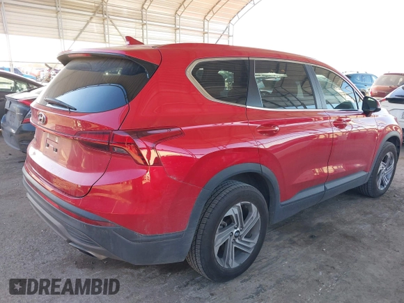 2021 Hyundai Santa Fe SE with VIN 5NMS14AJ5MH311823, listed as a IAAI auction lot 41301373 with 70,379 mi miles. Bid and sale history available at carsss.com. Image 4.