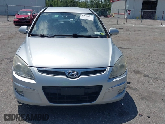 2009 Hyundai Elantra Touring with VIN KMHDC86E99U035163, listed as a IAAI auction lot 42049897 with 123,559 mi miles and . Bid and sale history available at DreamBid. Image 6.