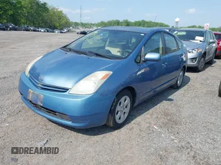 2005 Toyota Prius with VIN JTDKB22U457035511, listed as a IAAI auction lot 42175447 with 142,840 mi miles. Bid and sale history available at carsss.com. Image 2.