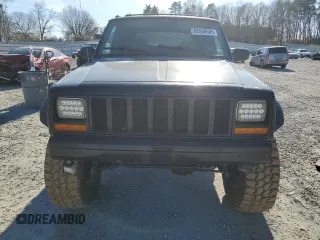 1997 Jeep Cherokee Country with VIN 1J4FJ78S2VL574492, listed as a Copart auction lot 88568685 with 244,465 mi miles and Salvage Title. Bid and sale history available at carsss.com. Image 5.