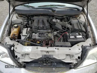 2004 Mercury Sable GS z VIN 1MEFM50U34G601378, wystawiony jako Copart lot #56952825 z przebiegiem 63 456 mil mil oraz Tytuł czysty. Historia ofert i sprzedaży dostępna na DreamBid. Obrazek 11.