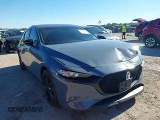 2023 Mazda 3 S Carbon Edition with VIN JM1BPBLM8P1611106, listed as a IAAI auction lot 42191902 with 37,244 mi miles and . Bid and sale history available at DreamBid. Image 1.