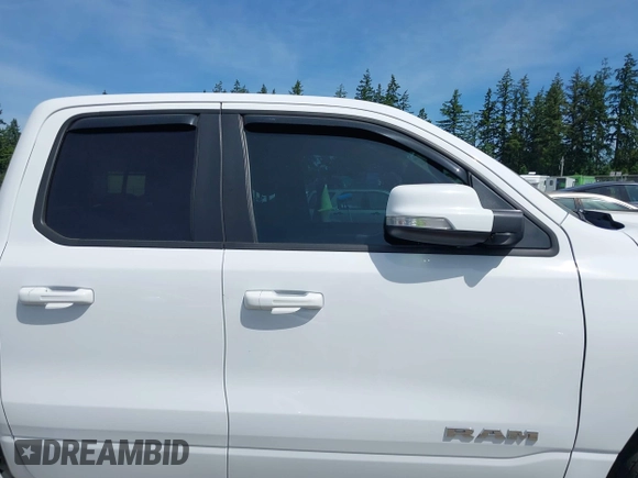 2022 Ram 1500 Big Horn with VIN 1C6SRFBT6NN164539, listed as a IAAI auction lot 42444414 with 54,343 mi miles and . Bid and sale history available at DreamBid. Image 13.