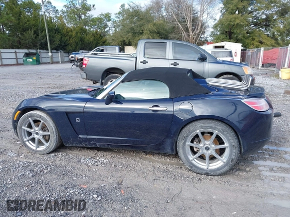 2008 Saturn Sky Red Line with VIN 1G8MG35X48Y109718, listed as a IAAI auction lot 41314770 with 128,465 mi miles. Bid and sale history available at carsss.com. Image 14.