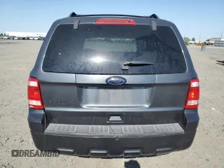 2008 Ford Escape XLS с VIN 1FMCU02Z08KB06103, выставлен на аукционе Copart как лот 60934415 с пробегом Не указан миль и Списание • Salvage title. История ставок и продаж доступна на DreamBid. Изображение 6.