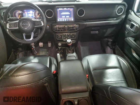 2021 Jeep Wrangler Unlimited Sahara High Altitude with VIN 1C4HJXEG9MW571844, listed as a Copart auction lot 81482334 with 77,409 mi miles and Salvage title. Bid and sale history available at DreamBid. Image 8.