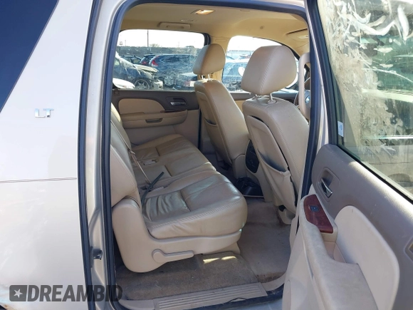2010 Chevrolet Suburban LT z VIN 1GNUKJE35AR260614, wystawiony jako IAAI lot #41835589 z przebiegiem 225 255 mil mil oraz . Historia ofert i sprzedaży dostępna na DreamBid. Obrazek 8.