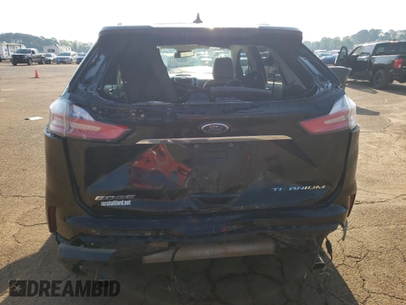 2020 Ford Edge Titanium с VIN 2FMPK3K90LBB63624, выставлен на аукционе Copart как лот 55143825 с пробегом 105 394 миль миль и Списание • Salvage title. История ставок и продаж доступна на DreamBid. Изображение 6.