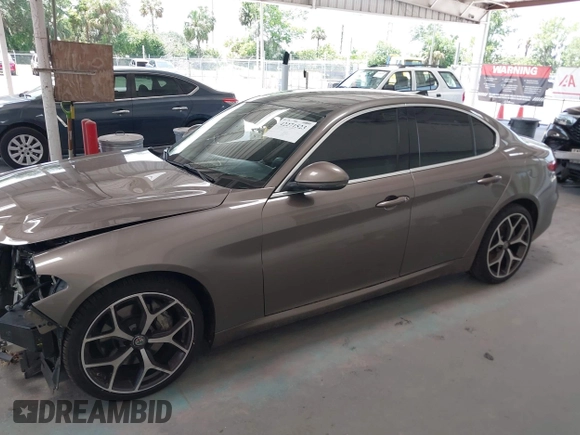2019 Alfa Romeo Giulia Ti Sport with VIN ZARFAMBN1K7599269, listed as a IAAI auction lot 42271523 with 46,556 mi miles and . Bid and sale history available at DreamBid. Image 14.