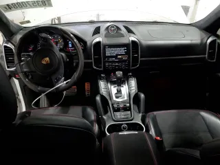 2013 Porsche Cayenne GTS with VIN WP1AD2A24DLA76344, listed as a Copart auction lot 83570884 with 63,704 mi miles and Salvage title. Bid and sale history available at DreamBid. Image 8.