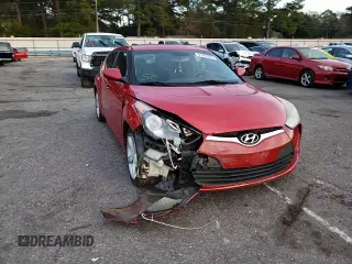 2014 Hyundai Veloster RE:FLEX z VIN KMHTC6AD1EU184837, wystawiony jako Copart lot #41497085 z przebiegiem 114 958 mil mil oraz Szkoda całkowita • Salvage title. Historia ofert i sprzedaży dostępna na DreamBid. Obrazek 14.