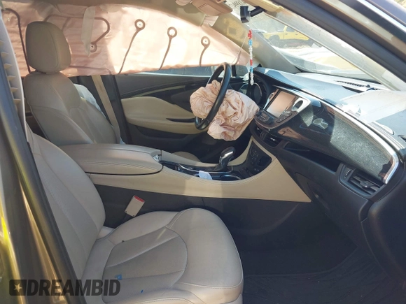 2018 Buick Envision Essence with VIN LRBFX1SA2JD026044, listed as a IAAI auction lot 41899421 with 116,912 mi miles and . Bid and sale history available at DreamBid. Image 5.