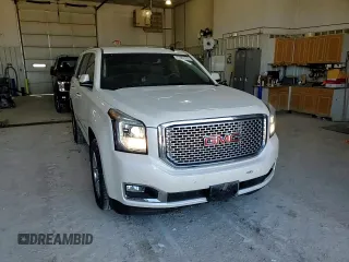 2015 GMC Yukon Denali with VIN 1GKS2CKJ7FR266750, listed as a Copart auction lot 47882125 with 121,705 mi miles and Salvage Title. Bid and sale history available at carsss.com. Image 12.