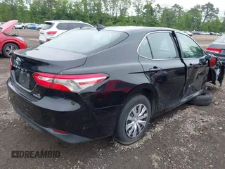 2019 Toyota Camry Hybrid LE z VIN 4T1B31HK5KU510055, wystawiony jako IAAI lot #42325522 z przebiegiem 97 000 mil mil oraz . Historia ofert i sprzedaży dostępna na DreamBid. Obrazek 4.
