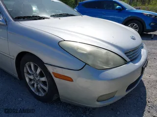 2002 Lexus ES 300 with VIN JTHBF30G220055704, listed as a IAAI auction lot 41994536 with 326,282 mi miles. Bid and sale history available at carsss.com. Image 12.