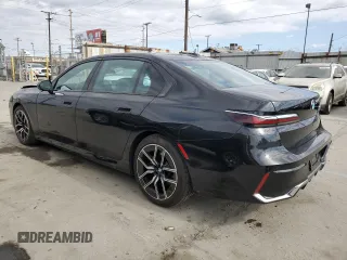 2024 BMW 7 Series 740i with VIN WBA23EH03RCP67206, listed as a Copart auction lot 54631285 with 22,901 mi miles and Salvage title. Bid and sale history available at DreamBid. Image 2.